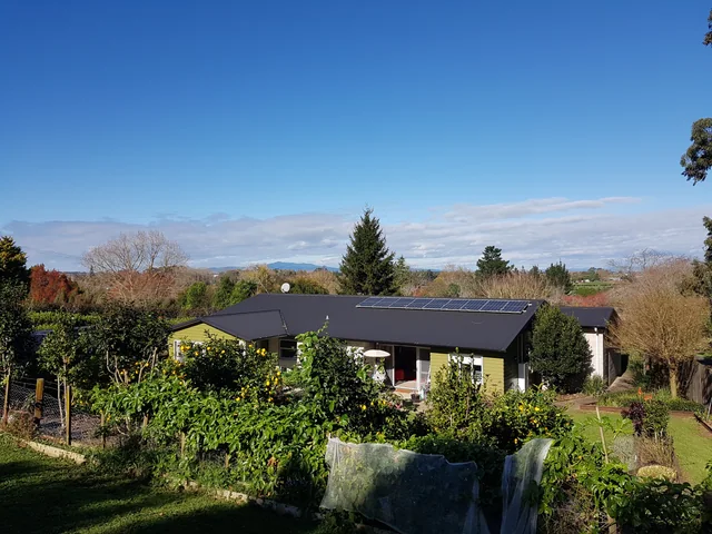 Home and fruit trees · owner photo, June 2023